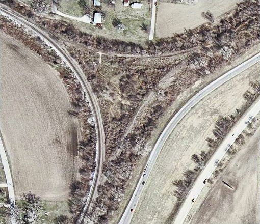 Die inzwischen überwachsene Königskurve in einer Luftaufnahme aus den 1960er-Jahren, welche die Nagoldtal- und die Enztalbahn direkt verband. Foto: Bechtle Foto: Schwarzwälder Bote