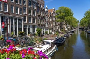 Die niederländische Hauptstadt ist auch im Sommer ein tolles Reiseziel. Foto: IMAGO/Jochen Tack/IMAGO/Jochen Tack