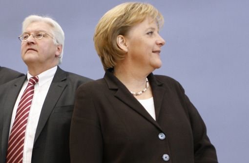 Bundeskanzlerin Angela Merkel un der ehemalige Außenminister Frank-Walter Steinmeier Foto: AP
